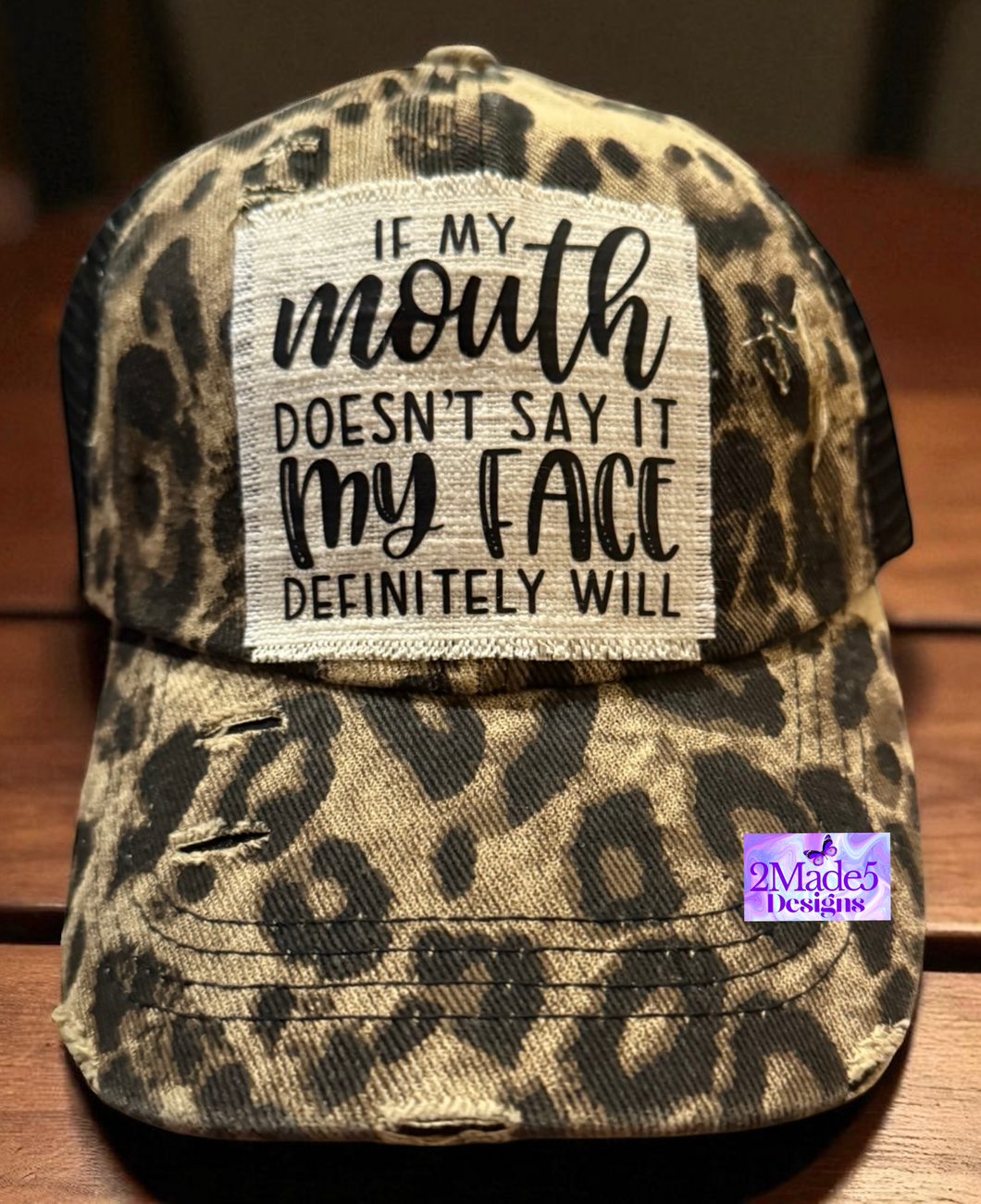 If My Mouth Doesn’t Say It My Face Definitely Will Distressed Leopard Criss Cross Ponytail Hat