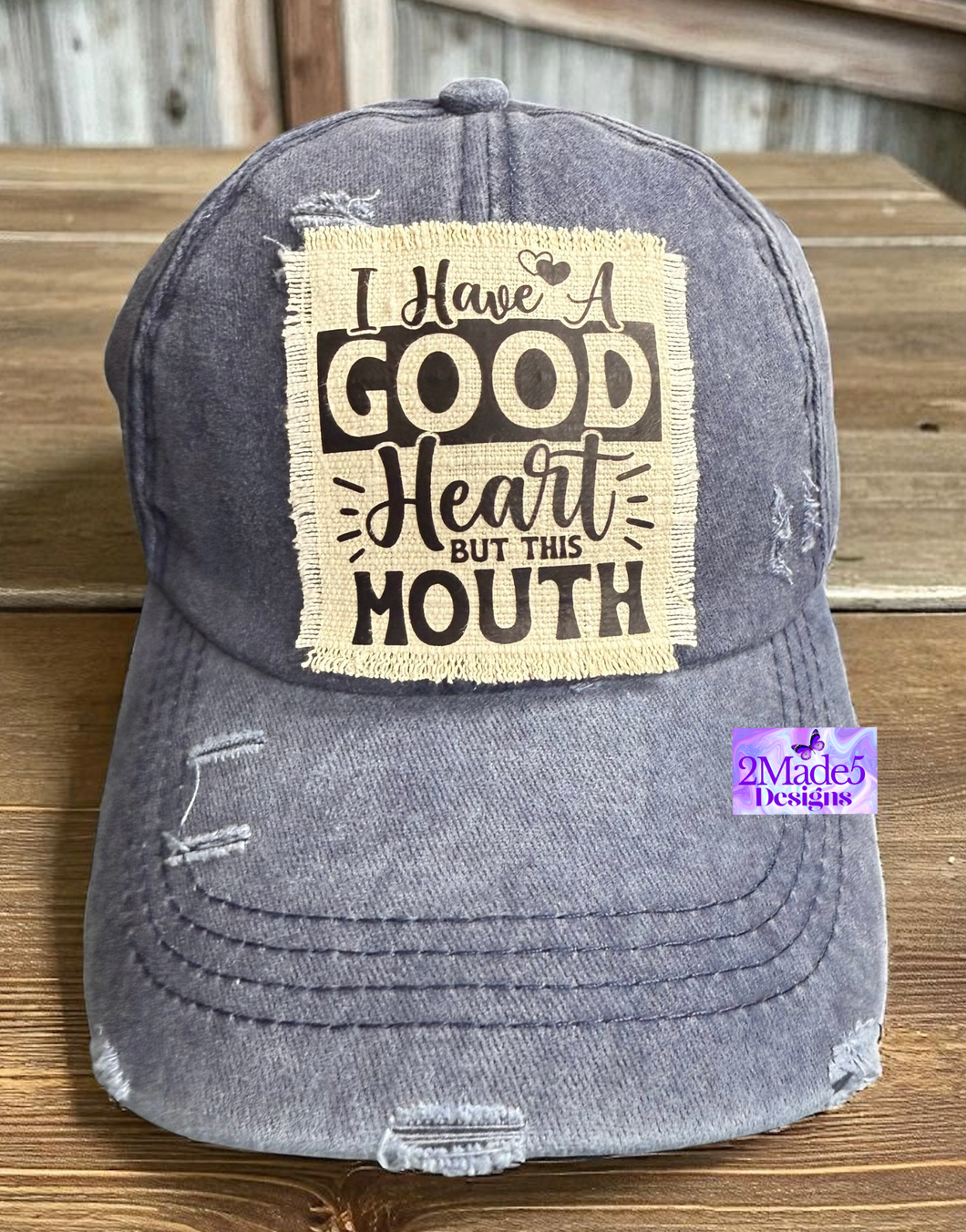 I Have A Good Heart But This Mouth Distressed Criss Cross Ponytail Hat