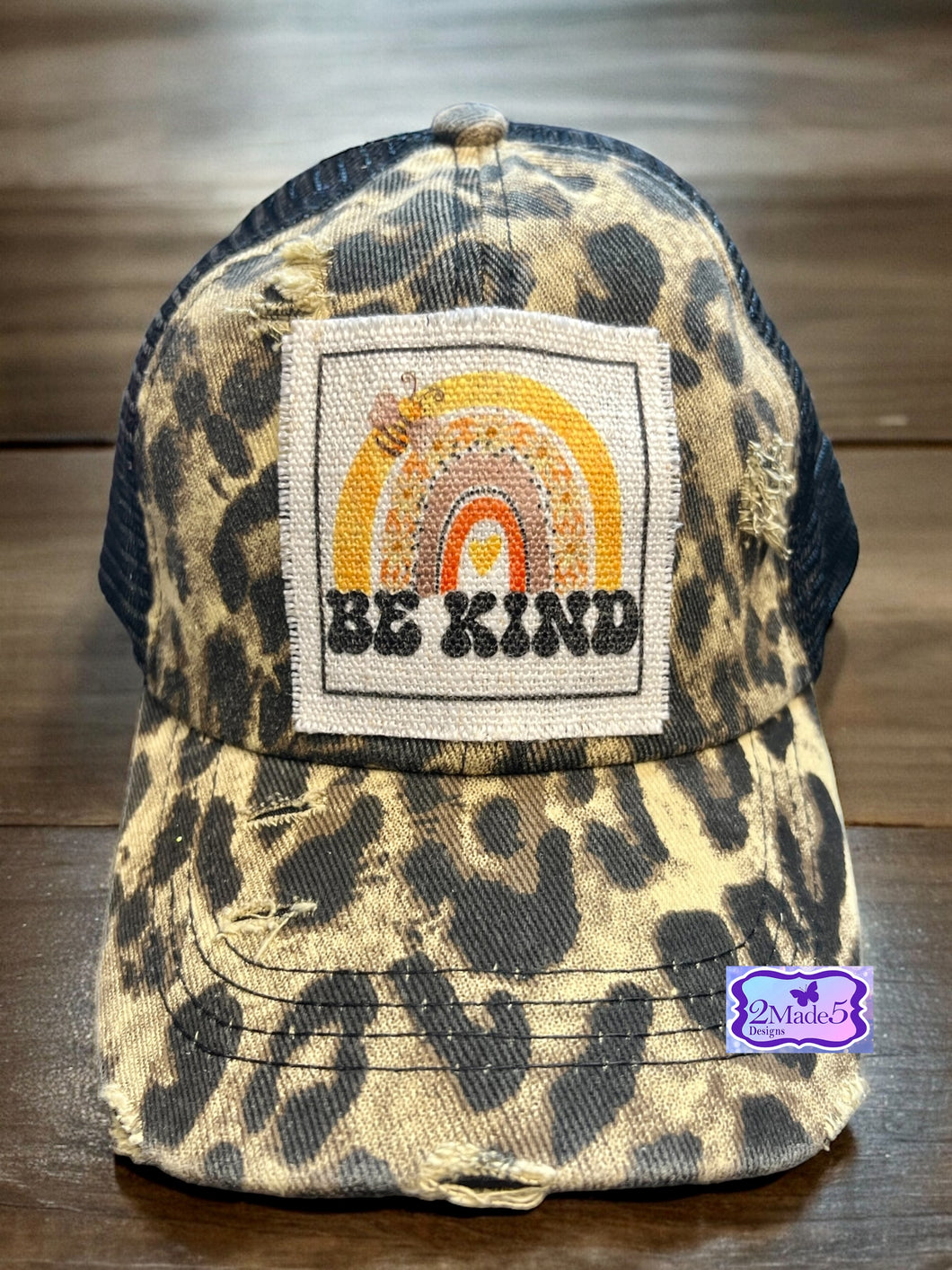 Be Kind Rainbow Distressed Leopard Criss Cross Ponytail Hat