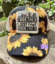 Load image into Gallery viewer, I Have It All Together Distressed Sunflower Criss Cross Ponytail Hat
