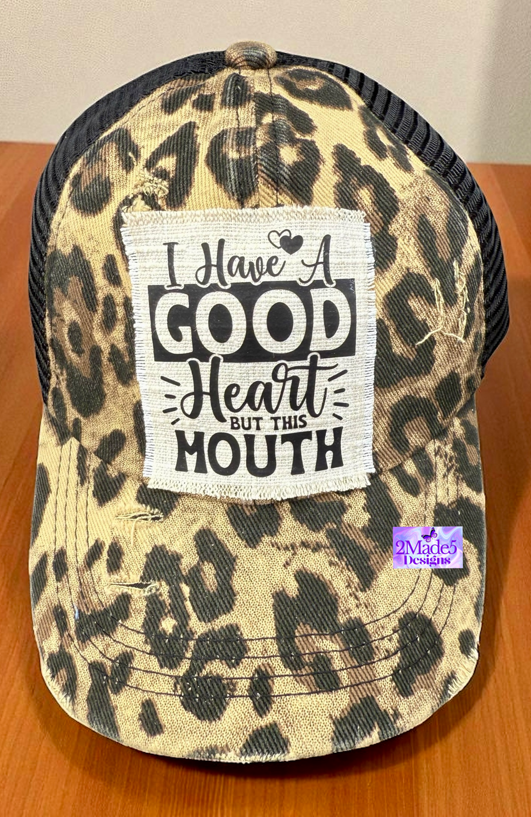 I Have A Good Heart But This Mouth Distressed Criss Cross Ponytail Hat