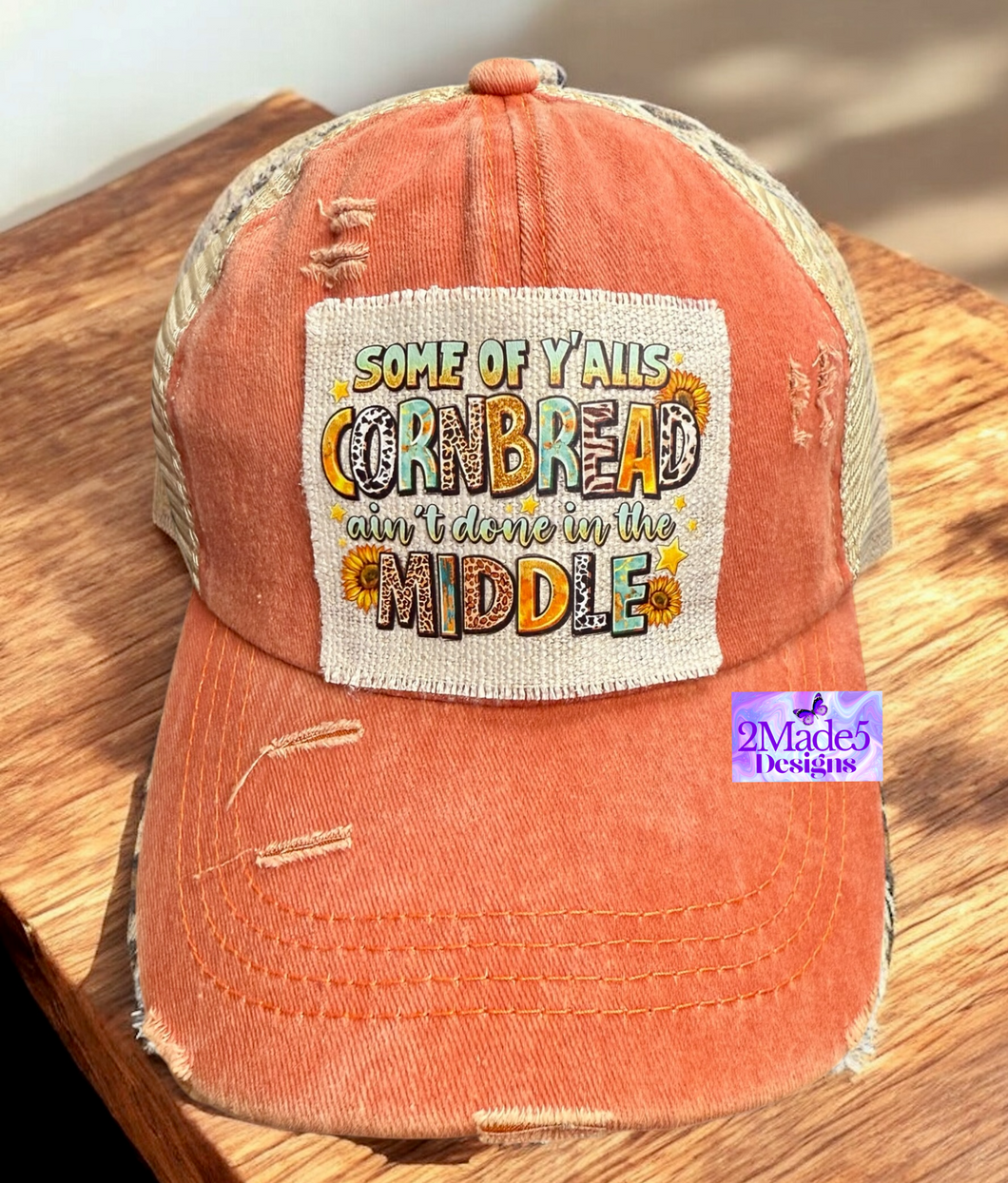 Some Of Y’alls Cornbread Ain’t Done In The Middle  Distressed Sunset Criss Cross Ponytail Hat