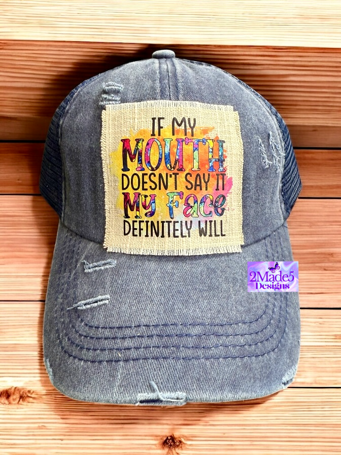 If My Mouth Doesn’t Say It My Face Definitely Will Distressed Criss Cross Blue Ponytail Hat
