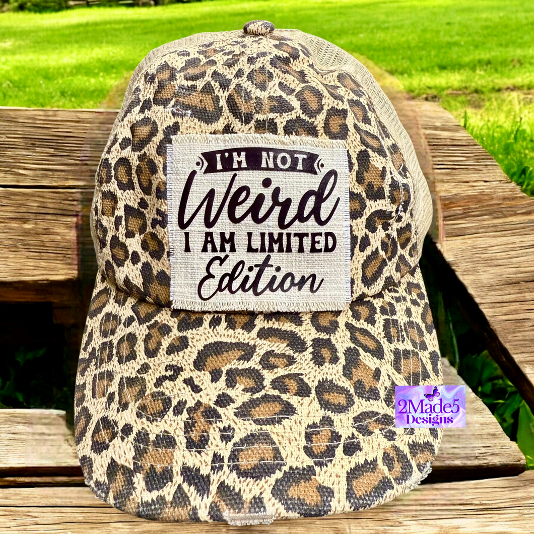 I’m Not Weird I Am Limited Edition Distressed Criss Cross Ponytail Hat