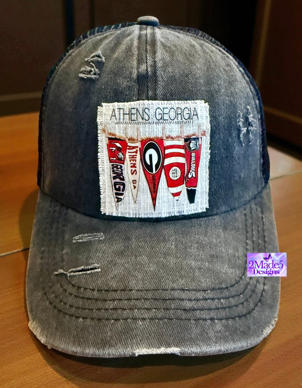 Georgia Pennant Distressed Black Criss Cross Ponytail Hat