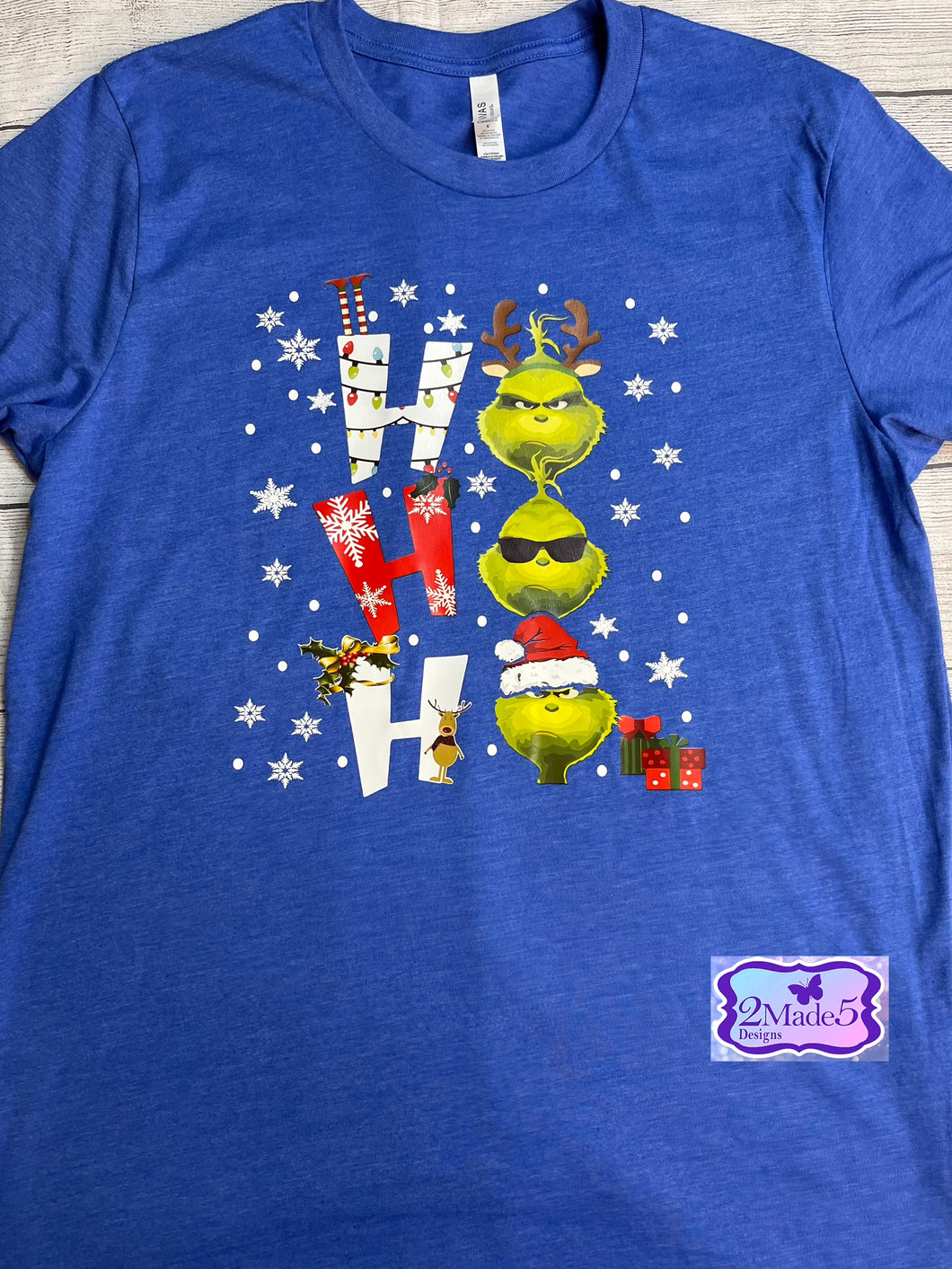 Ho Ho Ho Grinch on Bella Canvas Heather True Royal Shirt