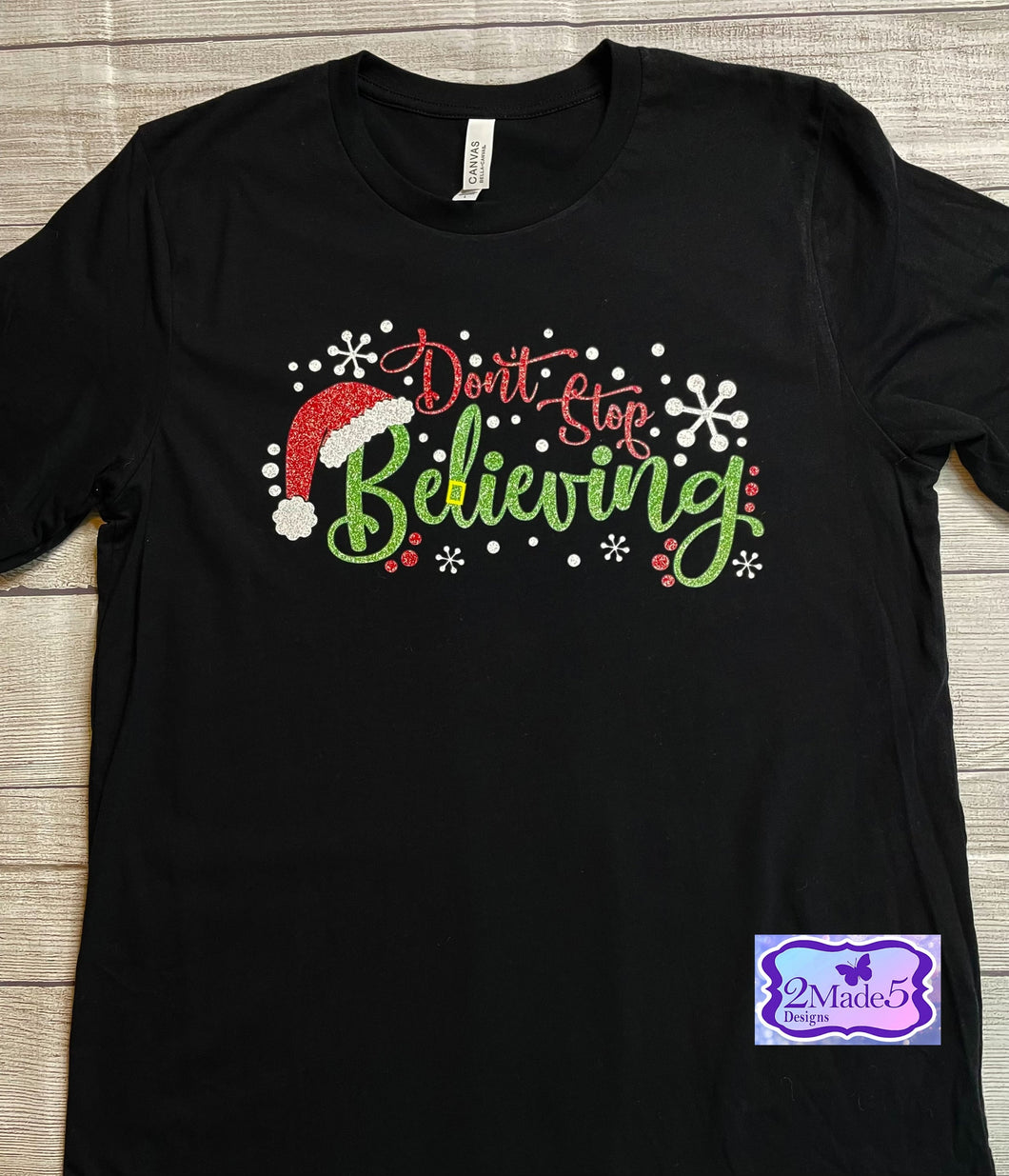 Don’t Stop Believing on Bella Canvas Black Shirt